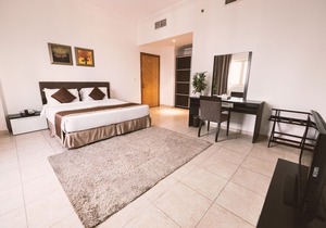 Magnum Hotel & Suites West Bay