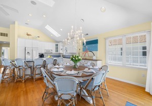 Master Suite with private deck full bath with jacuzzi tub, Large wrap around deck to dinner with the family. Beach path is on 48th Street to one of most desirable beach locations on the island.