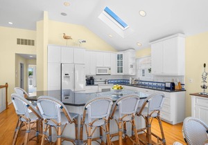 Master Suite with private deck full bath with jacuzzi tub, Large wrap around deck to dinner with the family. Beach path is on 48th Street to one of most desirable beach locations on the island.