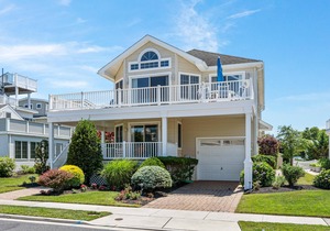 Master Suite with private deck full bath with jacuzzi tub, Large wrap around deck to dinner with the family. Beach path is on 48th Street to one of most desirable beach locations on the island.