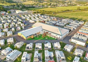 Modern and contemporary 12ft-wide caravan with one double and two twin.