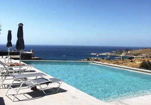 Modern home with 2 apartments, a swimming pool and sea view, in the area of Koundouros