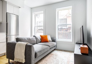 Modern Nolita 2BR w/W/D, large deck, easy walk to SoHo, by Blueground