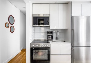 Modern Nolita 2BR w/W/D, large deck, easy walk to SoHo, by Blueground