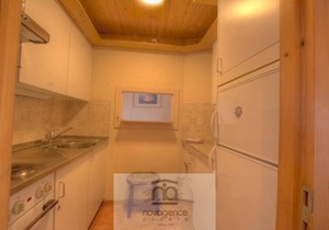 Nice 2 room flat south, 50m from the cable car (max. 4 persons). Living/dining room with fireplace,