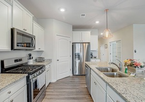 Ocean View Beach Club home with bay view, private tennis court & pool access