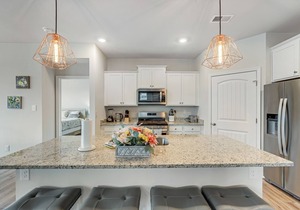Ocean View Beach Club home with bay view, private tennis court & pool access