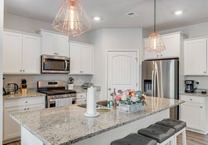Ocean View Beach Club home with bay view, private tennis court & pool access