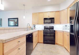 On Golf Course! Lovely Furnished, Private Laundry. Pool On-site