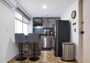 One Bedroom Balcony AC hot tub apartment with part time security