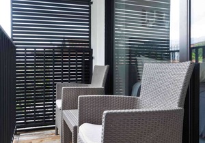 One Bedroom Balcony AC hot tub apartment with part time security