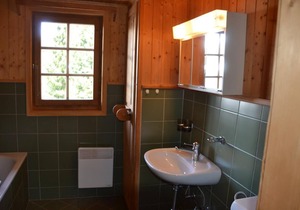Outside : flat on the ground floor and on the 1rst floor of a chalet, for 8 persons, access from the