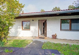 Quaint Chalet with Garden Terrace Fireplace Play Equipment