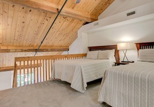 Recently updated, modern lodge room with open loft bedroom.