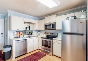 Second-floor ocean view condo with WiFi, shared pools, central AC, & shared W/D