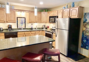Ski In Newly Refinished Condo ON THE RIVER. Stunning location near Main Street