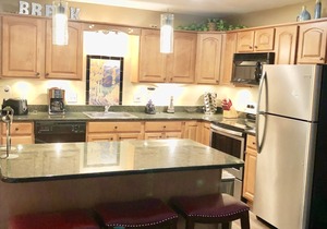 Ski In Newly Refinished Condo ON THE RIVER. Stunning location near Main Street
