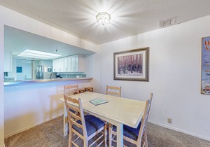 Ski-in/out condo with mountain view, private hot tub, deck & fireplace