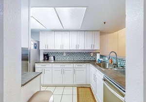 Ski-in/out condo with mountain view, private hot tub, deck & fireplace