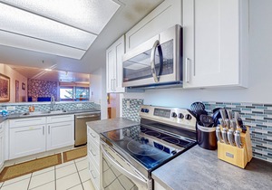 Ski-in/out condo with mountain view, private hot tub, deck & fireplace