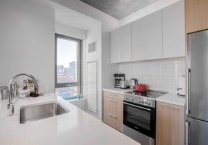 Sleek Kendall Sq 2BR, Gym, Doorman, walk to MIT by Blueground