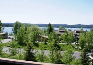 Spacious condo with balcony, lake view, and full kitchen - walk to the water