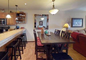 Spacious condo with balcony, lake view, and full kitchen - walk to the water