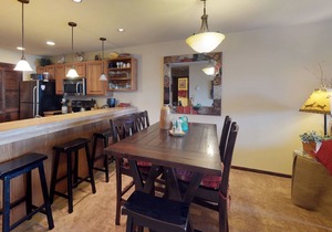 Spacious condo with balcony, lake view, and full kitchen - walk to the water