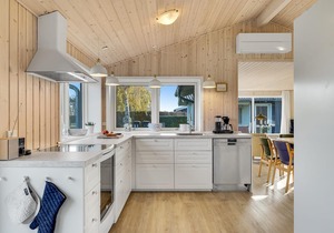 Spacious, family-friendly cottage in a quiet location close to the beautiful sandy beach.