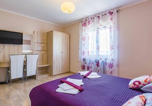 Spend a pleasant and unforgettable vacation in this beautiful and tastefully furnished apartment, on