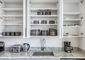 Stunning Logan Square 2BR w/Roof Deck & Gym, 1 block to L, by Blueground