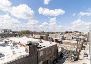 Tasteful Logan Square 2BR w/Gym, Roof Deck, 1 block to L, by Blueground