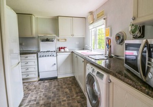 THE LODGE, with a garden in Old Buckenham