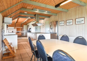 This cozy cottage is located under a romantic thatched roof.