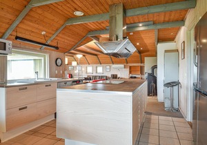 This cozy cottage is located under a romantic thatched roof.