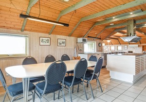 This cozy cottage is located under a romantic thatched roof.