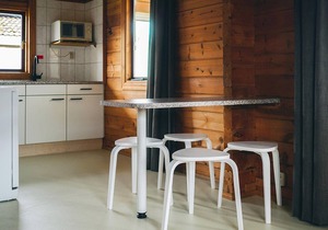 This cozy Finnish-style vacation home is located in a welcoming vacation park in Gramsbergen with ma