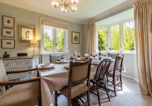 This much-loved detached family holiday home is set in glorious secluded gardens