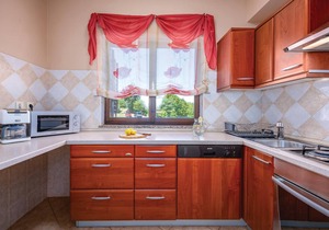 This vacation home with pool has a spacious outdoor area and konoba (social room).