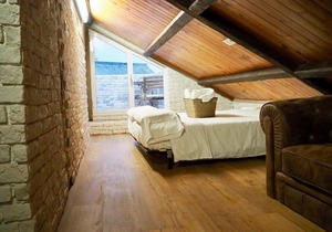 Tiny and cute apartment in the roof touching border