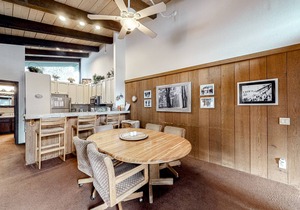 Two-story condo w/mountain views, balcony, gas grill, & wood-burning fireplace