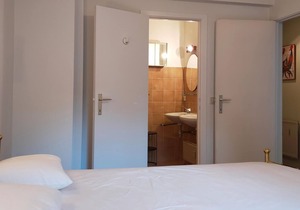 Welcome to this comfortable vacation apartment near the beach with side sea view.