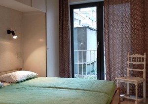 Welcome to this comfortable vacation apartment near the beach with side sea view.