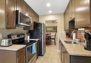 West End Retreat |1st Floor |Abbey Villas |Covered Patio |Fireplace |Walk-in Shower |Pool |Hot Tub