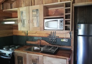 Wonderful rustic cabin 2, with native logs, on the banks of the Trancura River