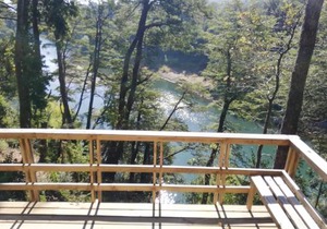 Wonderful rustic cabin 2, with native logs, on the banks of the Trancura River