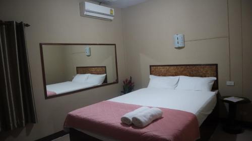 Kanthararom Hotel | ห้องพักทิวไม้