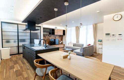 Nishi Ward Apartment | みらいステイKAWACHI サウナspaや温泉付き-絶景オーシャンビューを満喫