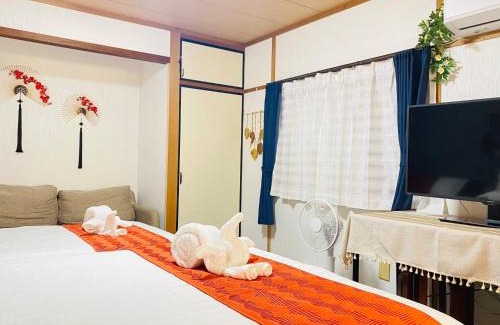 Shin-Osaka Apartment | 大阪梅田淀川花民宿家庭房b套