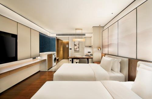 Jiangxia District Hotel | 武汉光谷豪生酒店